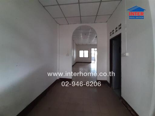 Spacious and well-lit hallway in a modern building