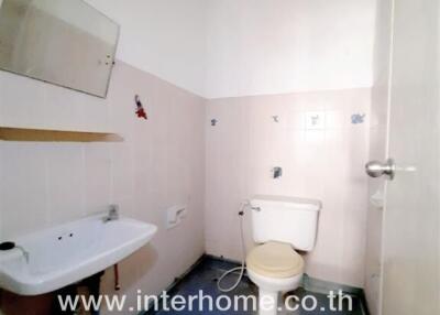 Compact bathroom with basic amenities