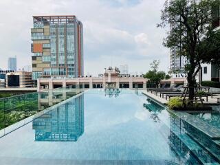 Luxurious rooftop swimming pool with cityscape view