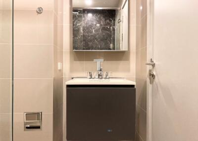 Modern bathroom with sleek vanity and stylish mirror
