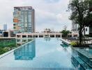 Luxurious rooftop swimming pool overlooking modern cityscape