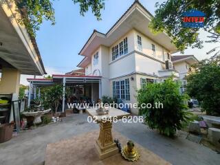 Spacious two-story house with well-maintained front yard