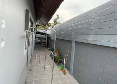 Narrow covered pathway in a residential house