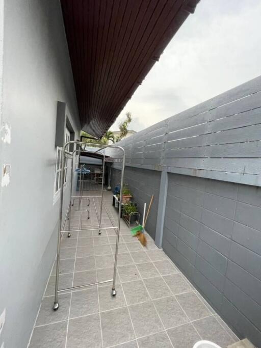 Narrow covered pathway in a residential house