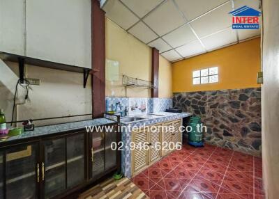 Spacious kitchen with traditional decor and ample counter space