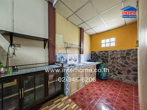 Spacious kitchen with traditional decor and ample counter space