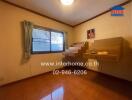 Spacious bedroom with wooden shelves and large window