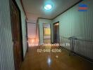 Spacious hallway in a residential property with decorative lighting