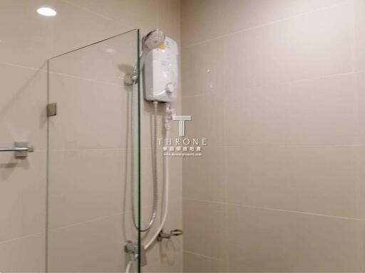 Modern bathroom with wall-mounted shower