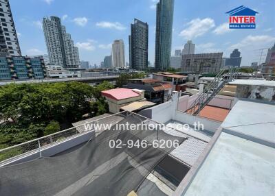 Urban skyline view from a rooftop terrace