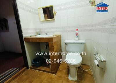 Compact bathroom with essential fixtures