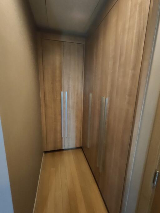 Narrow wooden hallway in a modern home