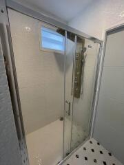 Modern bathroom with enclosed glass shower