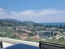 Panoramic sea view from a modern balcony