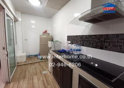 Modern kitchen with ample storage and sleek appliances