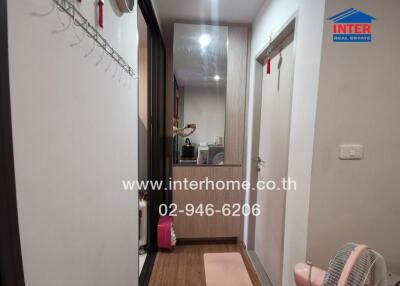 Compact hallway in modern apartment with bright lighting and clean design