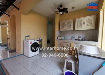 Spacious kitchen with modern appliances and ample storage space