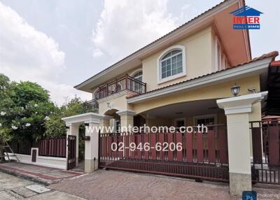 Spacious two-story residential house with gated fence