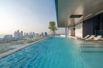Luxurious rooftop swimming pool with panoramic city view