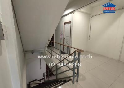 Clean and modern staircase inside a residential building