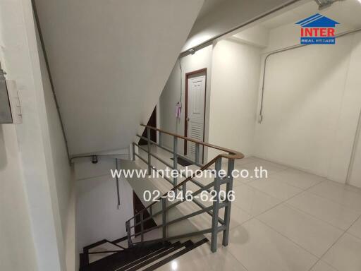 Clean and modern staircase inside a residential building