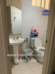 Compact bathroom with modern amenities