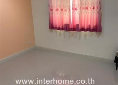 Spacious and bright empty bedroom with pink curtains