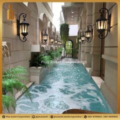 Luxurious building hallway with decorative water feature