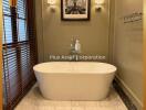 Elegant bathroom with freestanding bathtub and marble flooring