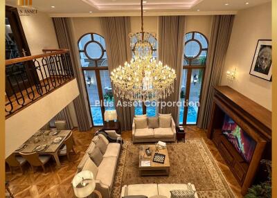 Elegant living room with chandelier and luxurious furnishings