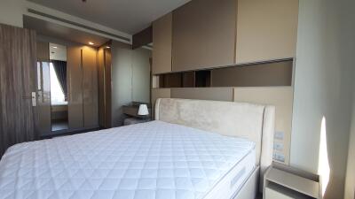 Modern bedroom with elegant design and ample lighting
