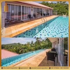 Luxurious poolside with panoramic view and ample seating area