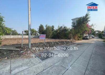 Vacant building lot with clear signage and street access