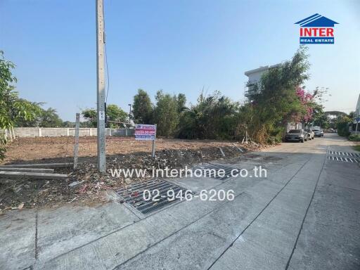 Vacant building lot with clear signage and street access