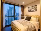 Luxurious bedroom with city view and ornate gold bed frame
