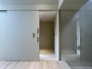 Modern hallway with wood flooring and minimalistic design