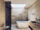 Elegant modern bathroom with natural light and freestanding bathtub