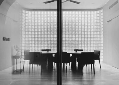 Elegant monochrome dining room with traditional decor