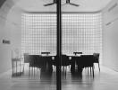 Elegant monochrome dining room with traditional decor