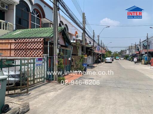 Street view of residential neighborhood with row houses