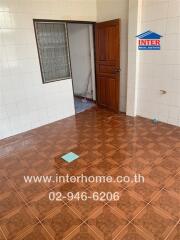 Unfurnished bedroom in need of renovation with tiled flooring