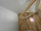 Interior view of a wooden staircase in a modern home