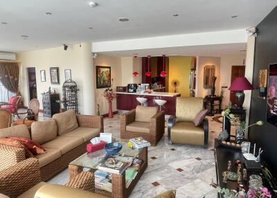 Spacious and elegantly decorated living room with connected dining area