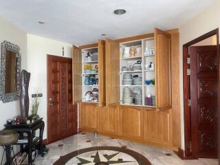Spacious kitchen with wooden cabinets and modern amenities