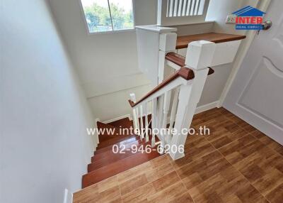 Elegant wooden staircase inside a modern home