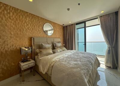 Luxurious bedroom with ocean view and stylish decor