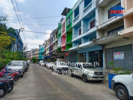 Colorful townhouses along a quiet street