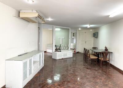 Spacious living room with integrated kitchen and dining area