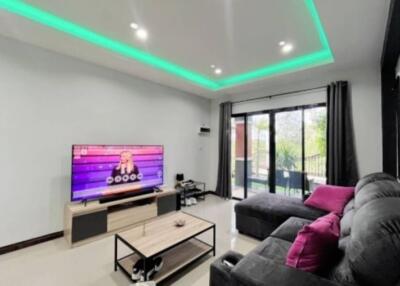 Modern living room with stylish decor and ambient lighting