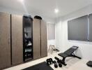 Modern bedroom with gym equipment
